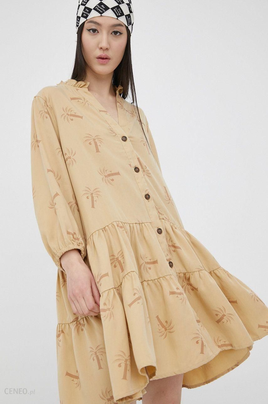 Femi Stories sukienka kolor beżowy mini rozkloszowana